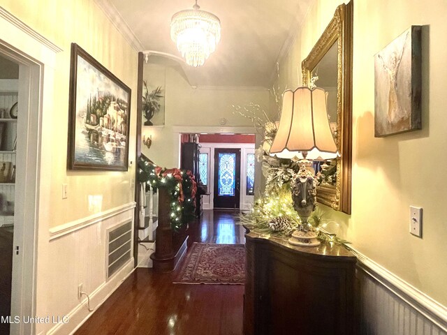 521 Holland Ave, Philadelphia, MS 39350 - hallway featuring crown molding, dark hardwood / wood-style floors, and a notable chandelier