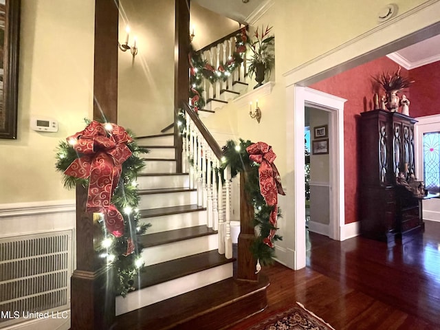521 Holland Ave, Philadelphia, MS 39350 - stairs featuring wood-type flooring and crown molding