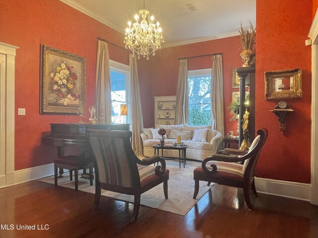 521 Holland Ave, Philadelphia, MS 39350 - sitting room featuring hardwood / wood-style flooring, crown molding, and a chandelier