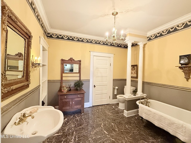 521 Holland Ave, Philadelphia, MS 39350 - bathroom featuring a bathtub, crown molding, toilet, a notable chandelier, and decorative columns