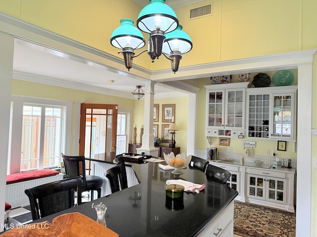 521 Holland Ave, Philadelphia, MS 39350 - dining room with crown molding and a notable chandelier