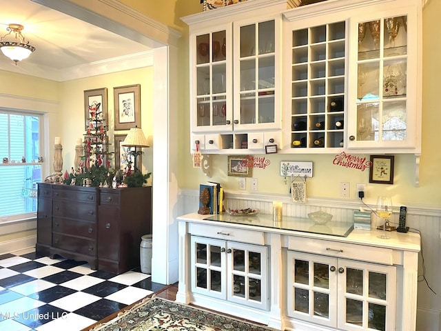 521 Holland Ave, Philadelphia, MS 39350 - bar featuring white cabinetry and crown molding