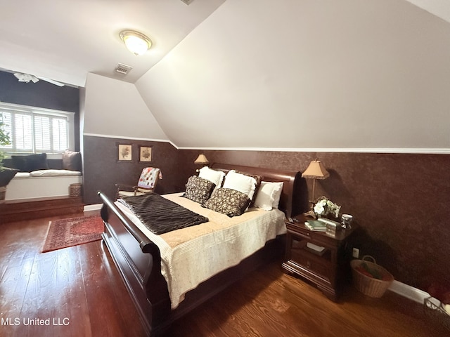 521 Holland Ave, Philadelphia, MS 39350 - bedroom featuring dark hardwood / wood-style floors and lofted ceiling