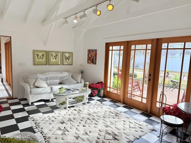 521 Holland Ave, Philadelphia, MS 39350 - living room featuring lofted ceiling with beams, rail lighting, and french doors