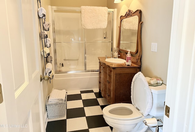 521 Holland Ave, Philadelphia, MS 39350 - full bathroom with shower / bath combination with glass door, vanity, and toilet
