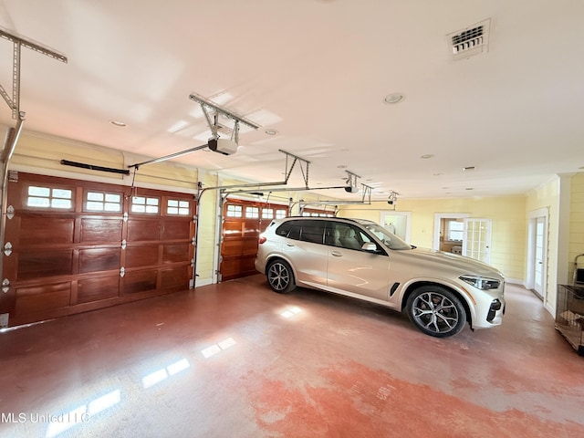 521 Holland Ave, Philadelphia, MS 39350 - garage featuring a garage door opener