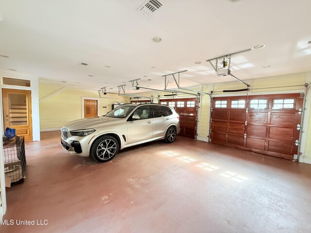 521 Holland Ave, Philadelphia, MS 39350 - garage featuring a garage door opener