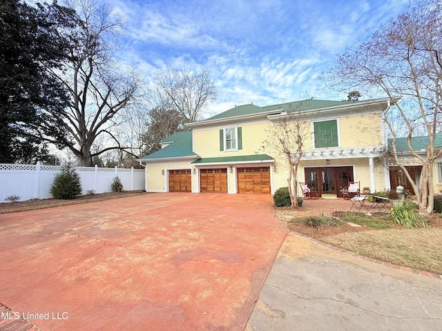 521 Holland Ave, Philadelphia, MS 39350 - view of front of house with french doors and a garage