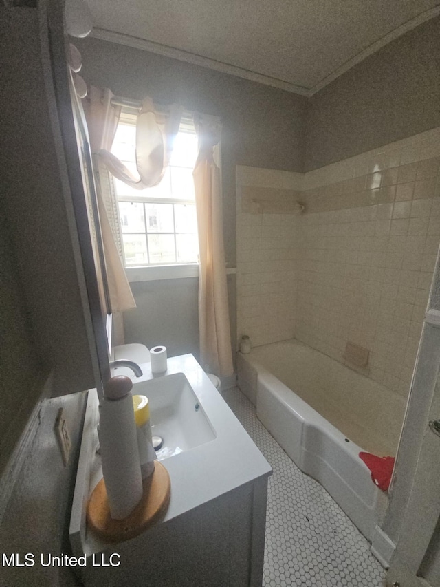 full bath with vanity, tub / shower combination, crown molding, and tile patterned floors