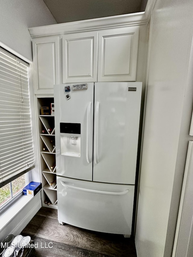 17500 Goff Farm Rd, Moss Point, MS 39562 - kitchen view of white refrigerator with ice dispenser, dark wood finished floors, and white cabinetry