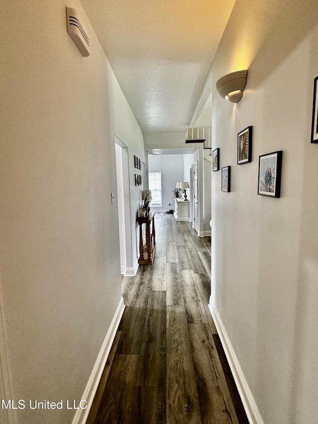 17500 Goff Farm Rd, Moss Point, MS 39562 - hallway with dark wood-type flooring and baseboards