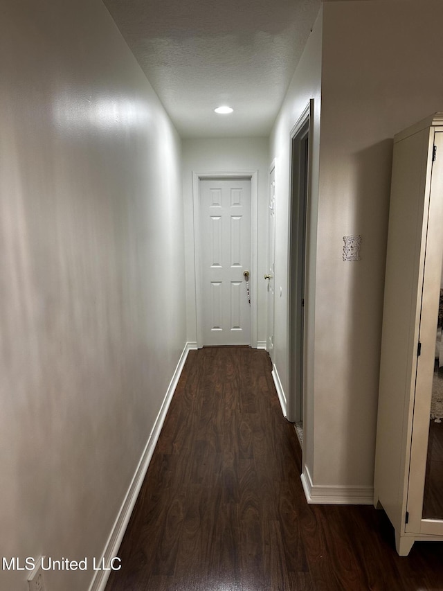 17500 Goff Farm Rd, Moss Point, MS 39562 - corridor with dark wood-type flooring and baseboards