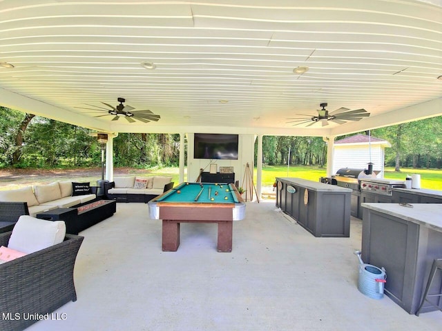 17500 Goff Farm Rd, Moss Point, MS 39562 - view of patio featuring outdoor lounge area, a ceiling fan, grilling area, and view of wooded area