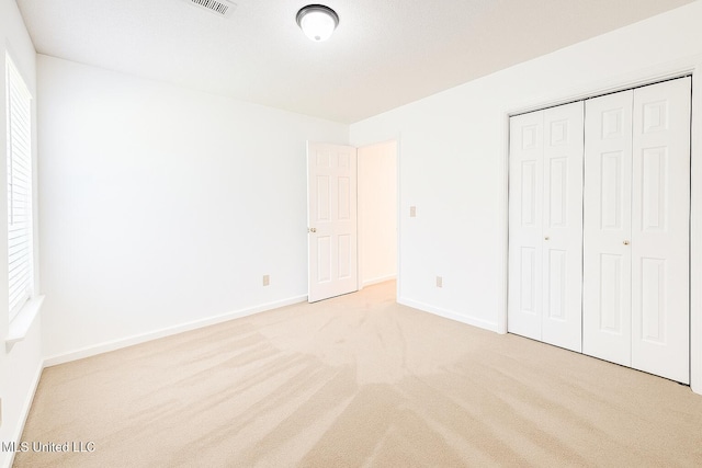 70 Yarbrough Loop, Holly Springs, MS 38635 - unfurnished bedroom with carpet floors and a closet