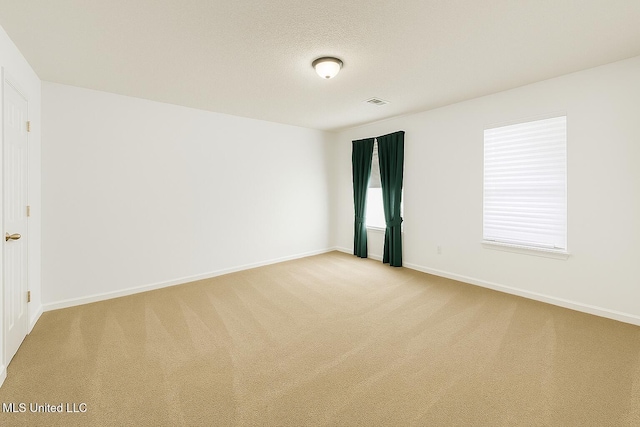 70 Yarbrough Loop, Holly Springs, MS 38635 - empty room with carpet flooring and baseboards