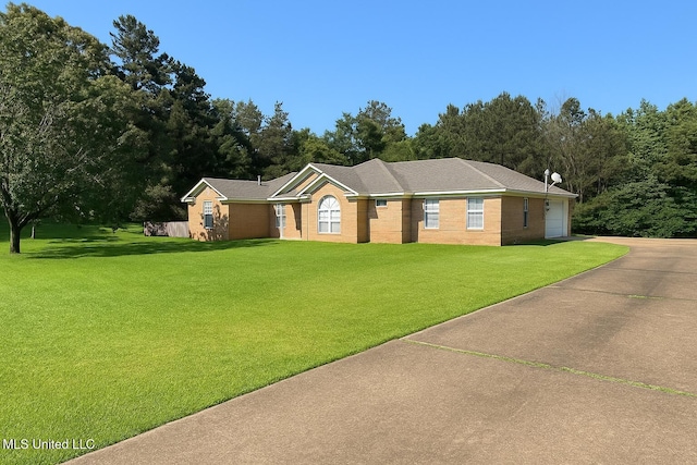 70 Yarbrough Loop, Holly Springs, MS 38635 - ranch-style home featuring concrete driveway and a front yard