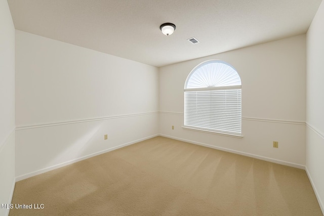 70 Yarbrough Loop, Holly Springs, MS 38635 - carpeted empty room with baseboards