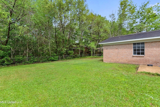view of yard with fence