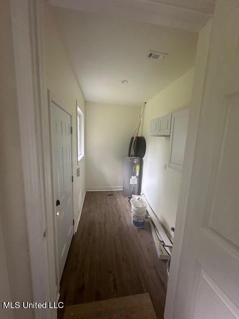 corridor with dark hardwood / wood-style floors