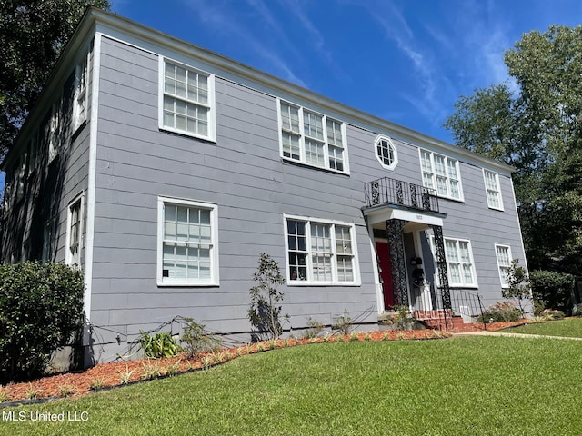 colonial house with a front yard