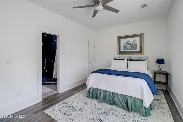 bedroom featuring dark hardwood / wood-style flooring and ceiling fan