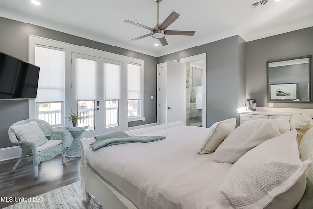 bedroom featuring french doors, dark wood-type flooring, connected bathroom, ornamental molding, and ceiling fan