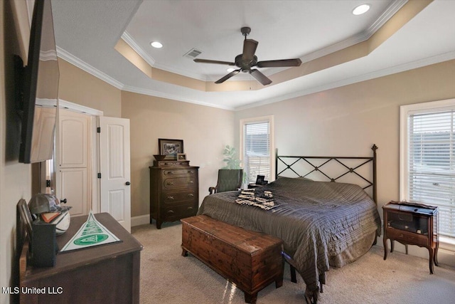 136 Mullherrin Dr, Madison, MS 39110 - bedroom featuring a tray ceiling, multiple windows, light colored carpet, and visible vents