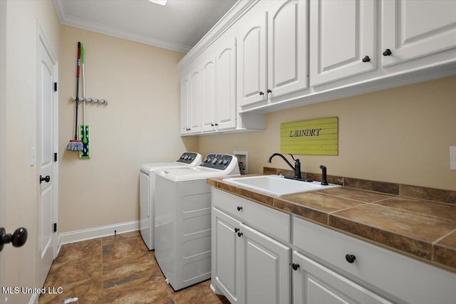 136 Mullherrin Dr, Madison, MS 39110 - washroom with baseboards, a sink, ornamental molding, cabinet space, and washer and clothes dryer
