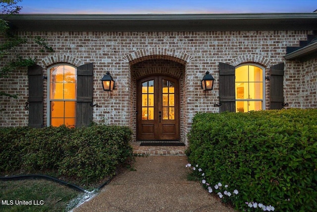 136 Mullherrin Dr, Madison, MS 39110 - property entrance featuring french doors and brick siding