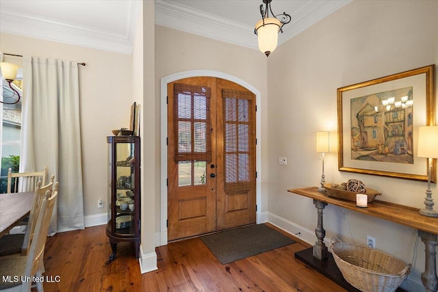 136 Mullherrin Dr, Madison, MS 39110 - entrance foyer with crown molding, wood finished floors, baseboards, and arched walkways