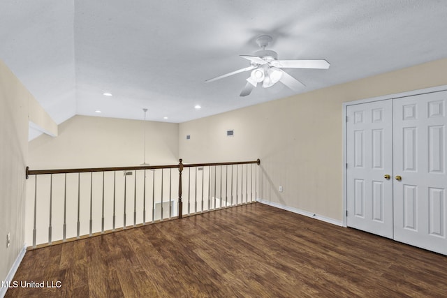 unfurnished room with dark wood-style floors, recessed lighting, ceiling fan, and baseboards