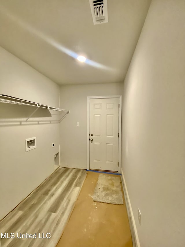 laundry room with washer hookup and electric dryer hookup