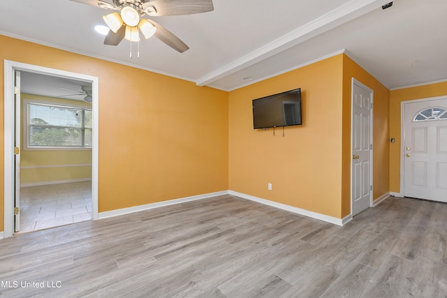 interior space with crown molding, light hardwood / wood-style flooring, and ceiling fan