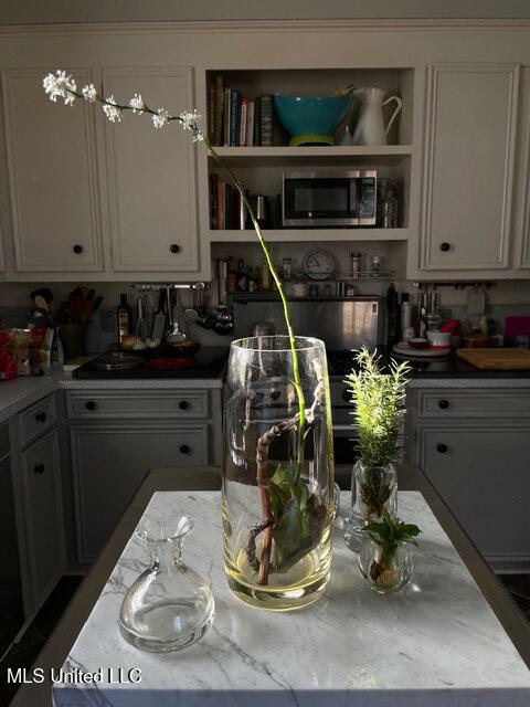 kitchen with light stone countertops