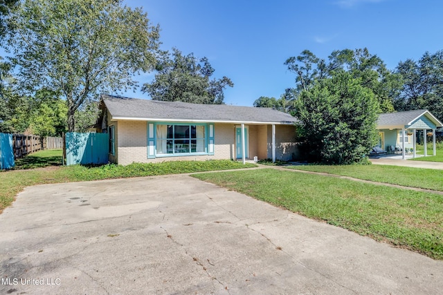 ranch-style house with a front yard