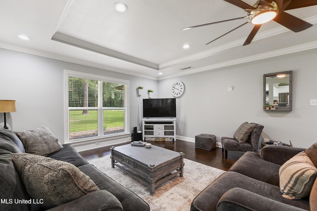 17508 John Cumbest Rd, Moss Point, MS 39562 - living area with a raised ceiling, wood finished floors, ceiling fan, ornamental molding, and recessed lighting