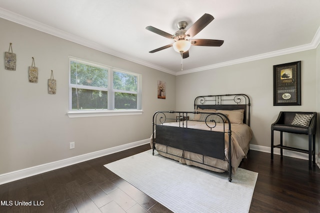 17508 John Cumbest Rd, Moss Point, MS 39562 - bedroom featuring crown molding, baseboards, wood finished floors, and a ceiling fan