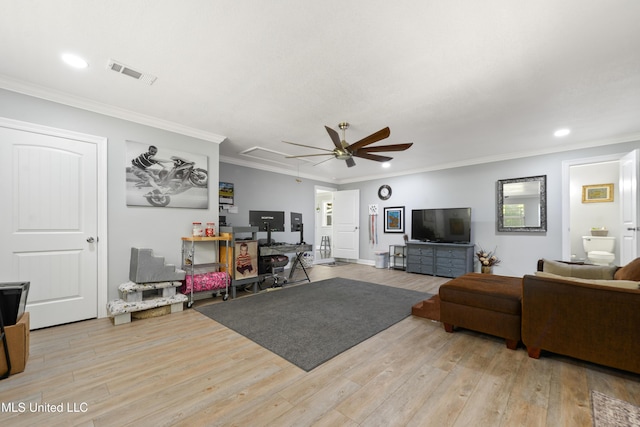 17508 John Cumbest Rd, Moss Point, MS 39562 - living area featuring ceiling fan, light wood-type flooring, ornamental molding, attic access, and recessed lighting