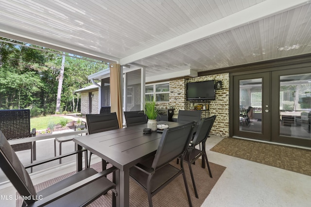17508 John Cumbest Rd, Moss Point, MS 39562 - view of patio with french doors and outdoor dining area