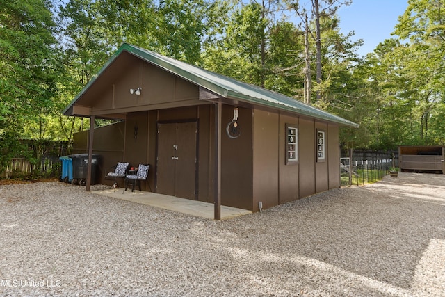 17508 John Cumbest Rd, Moss Point, MS 39562 - garage with view of wooded area