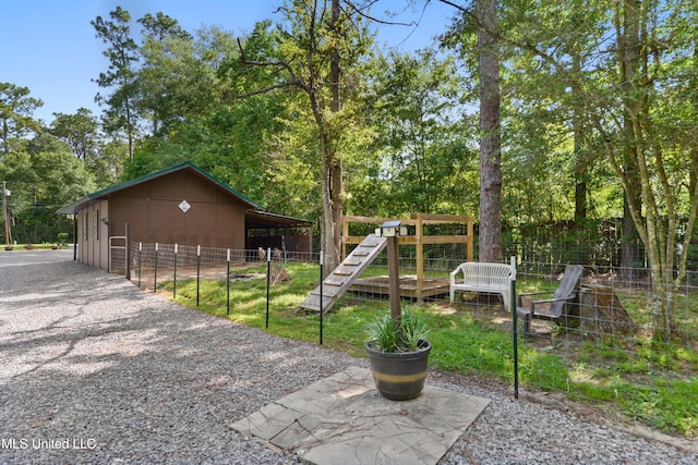 17508 John Cumbest Rd, Moss Point, MS 39562 - view of patio featuring an outdoor structure and a pole building