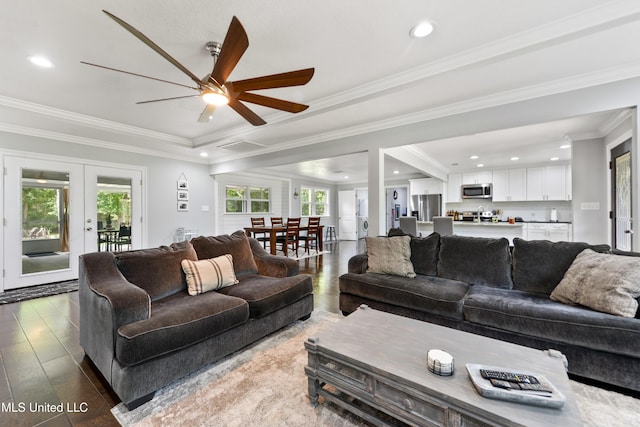 17508 John Cumbest Rd, Moss Point, MS 39562 - living room featuring french doors, a ceiling fan, recessed lighting, dark wood-style flooring, and ornamental molding