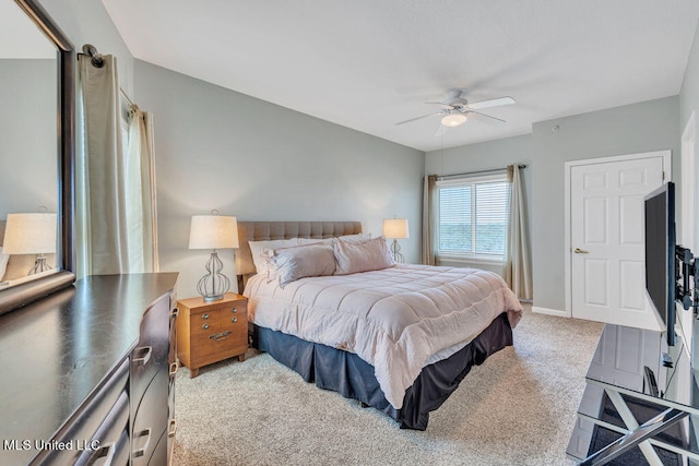 carpeted bedroom featuring ceiling fan