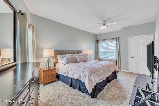 bedroom featuring carpet floors, baseboards, and a ceiling fan