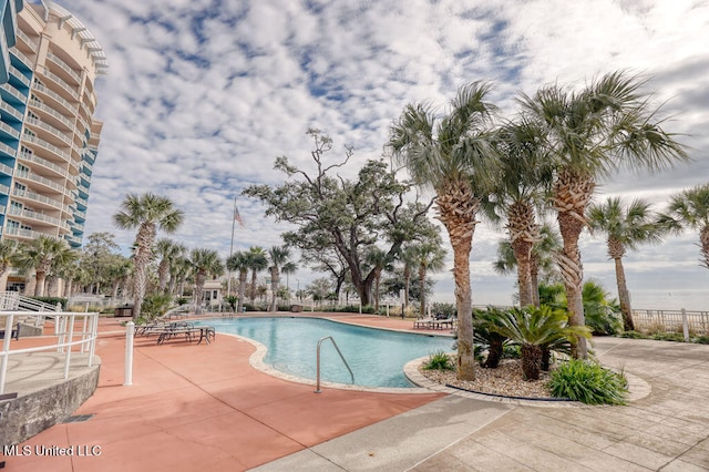 view of swimming pool featuring a patio