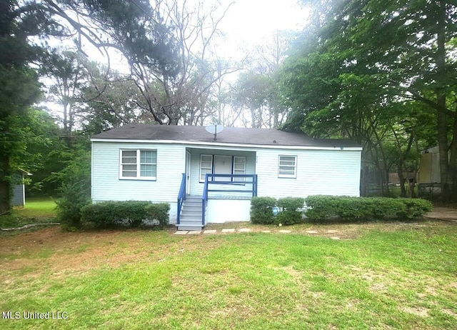 954 Winn St, Jackson, MS 39204 - view of front of property with a front yard and a porch