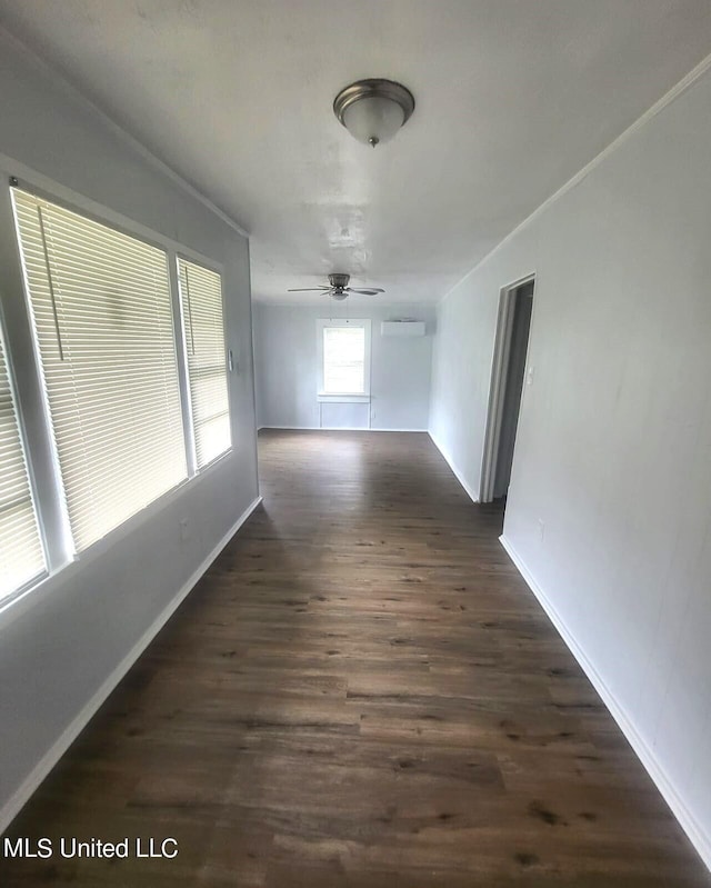 954 Winn St, Jackson, MS 39204 - spare room featuring a ceiling fan, dark wood finished floors, and baseboards