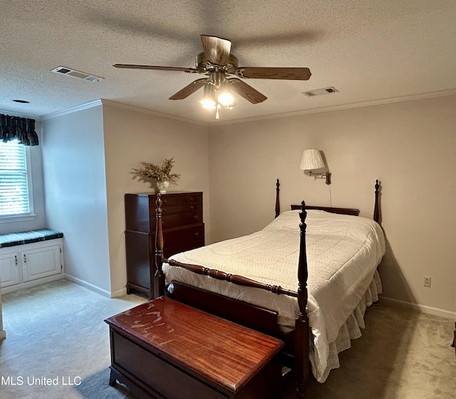 502 Frederick Dr, Cleveland, MS 38732 - bedroom with light colored carpet, ornamental molding, a textured ceiling, baseboards, and a ceiling fan