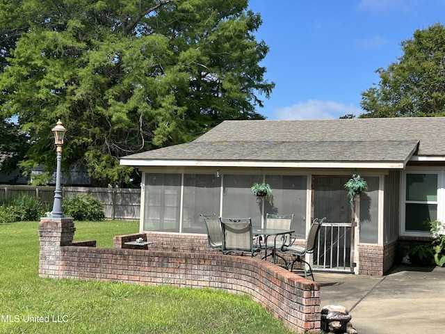 502 Frederick Dr, Cleveland, MS 38732 - view of patio featuring a sunroom
