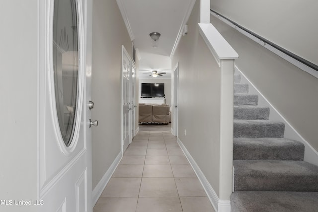 hall with light tile patterned flooring